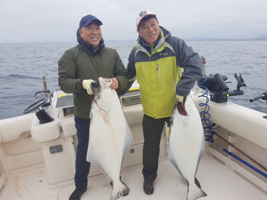 Two happy customers May 13, 2019. The halibut are in early!